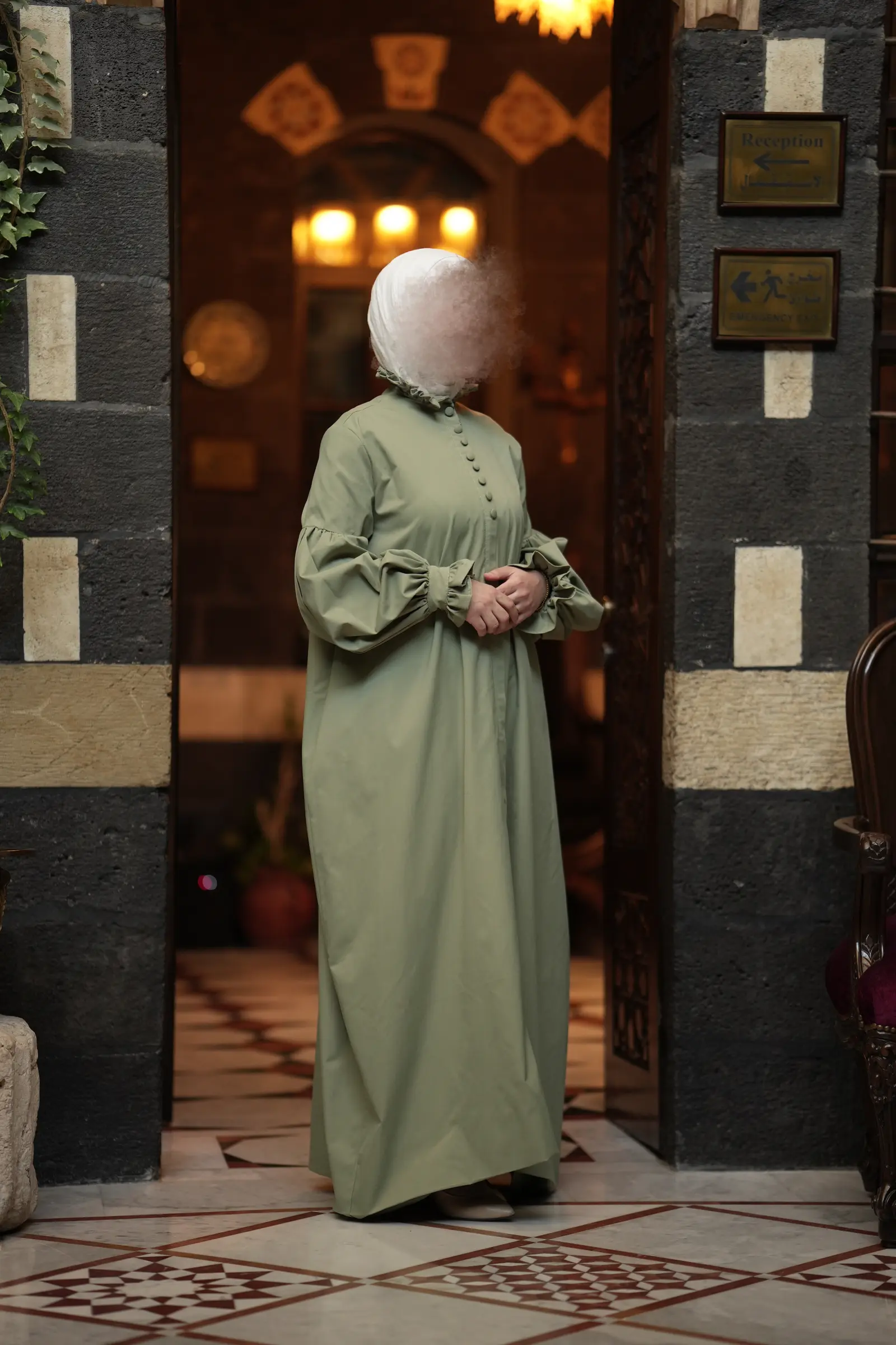 مانطو "من هُنا" زيتي